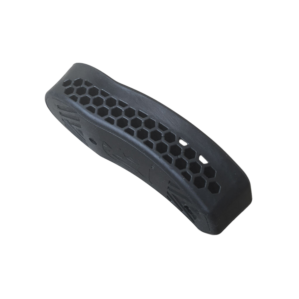 A black textured rubber or butt pad with a honeycomb pattern and molded finger grooves, shown on a transparent background.