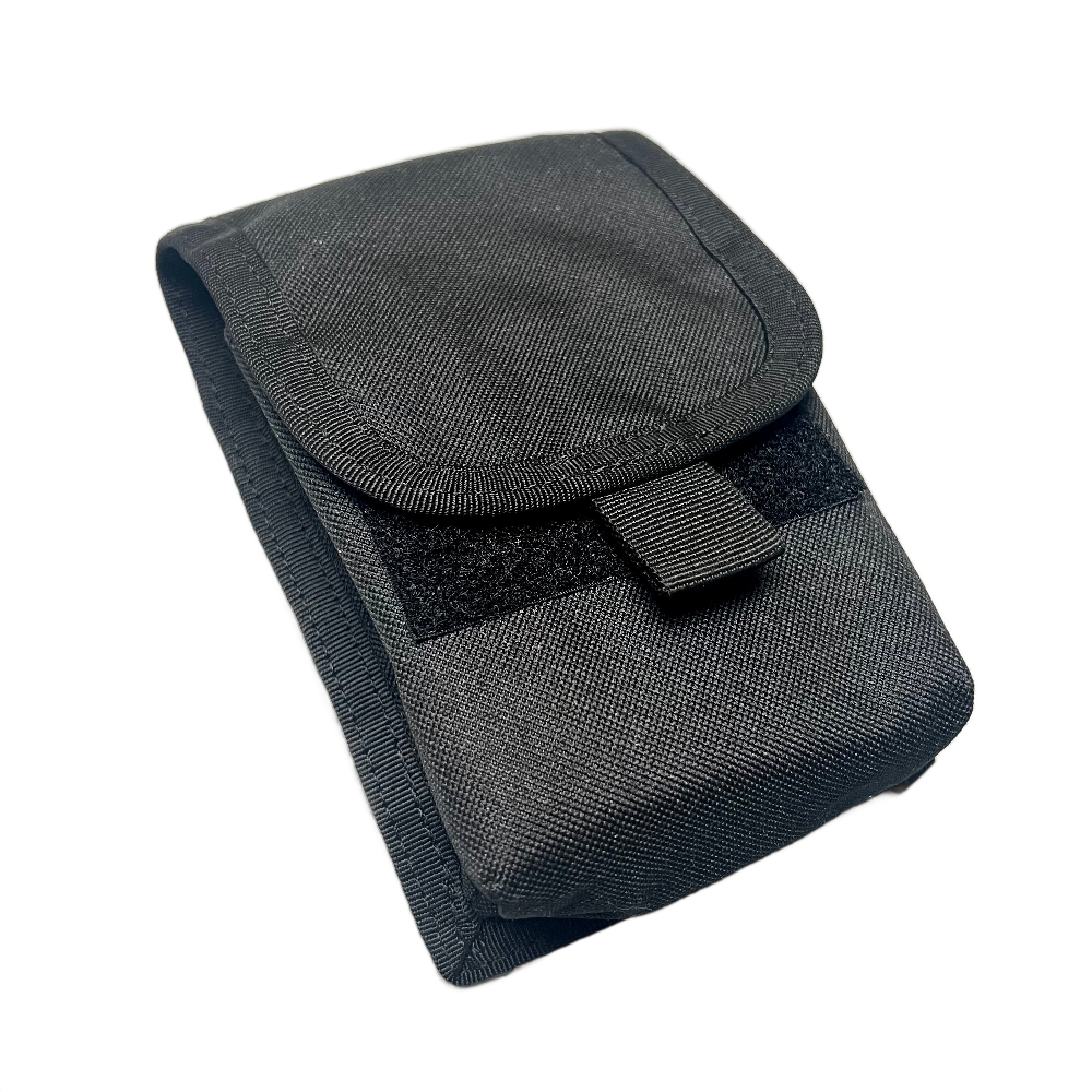 A black tactical utility pouch made of durable woven fabric, featuring a flap closure with a hook-and-loop fastener and a small tab, shown on a transparent background.