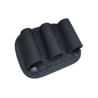A black nylon multi-pocket holster or pouch with three vertical elastic loops and two snap-button closures, shown on a transparent background.
