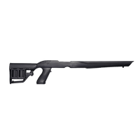 Full-length right-side profile view of a matte black synthetic rifle chassis featuring an adjustable skeletonized buttstock and ergonomic pistol grip, isolated on a transparent background.