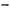 Product shot of a matte black replacement forend accessory with accessory attachment slots, displayed on a transparent backdrop.
