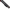 Close-up of a black textured firearm stock or receiver component with a dark metallic knob and a small red accent visible at the top left, isolated on a transparent background.