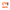 An orange molded plastic rifle stock and handguard set, shown from the side profile on a transparent background.