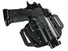 A black OMNICARRY multi-fit holster for 1911/2011 variants, with foam & mesh backer, designed for outside the waistband carry.