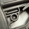 Close-up of a black tactical rifle buttstock component.