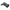 A black molded plastic or rubber pistol grip with textured grip panels and a smooth outer barrel, shown on a transparent background.